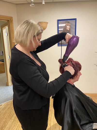 Sarah, a stylist at the Orchard Hairdresing and Beauty Services in Cowley, Oxford